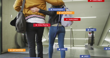 Poster - Image of social media icons floating over couple embracing on escalators