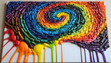 Colorful spiral art made from melted crayons on canvas  