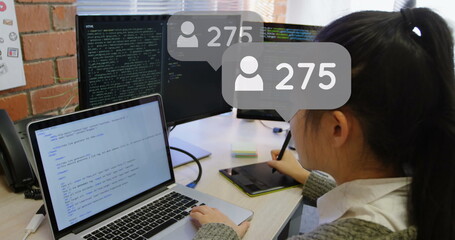 Poster - image of icons and numbers over woman using tablet and laptop