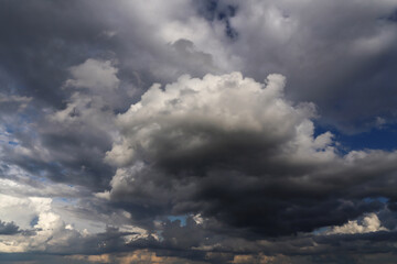 Wall Mural - Epic Dramatic Storm sky with dark cumulus rainy clouds abstract background texture, thunderstorm