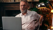© Yuliia - Old Caucasian man work laptop computer back pain health medicine suffer male pensioner elderly businessman office feel ache backache disease arthritis overwork spine osteoporosis business home problem