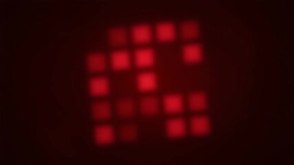 Poster - Abstract red light pattern creating a blurred geometric design with dark background and soft glowing squares