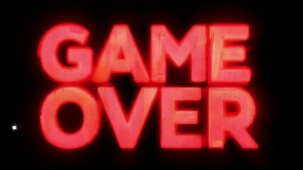 Poster - Neon sign reading 'Game Over' glowing in dark background