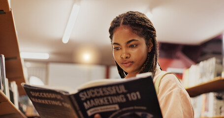 Poster - Woman, reading and book as student in library for research, study marketing and career preparation. African person, textbook or information on business knowledge, education exam and university thesis
