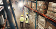 © peopleimages.com - Above, distribution and business people with inventory, logistics and cooperation with supply chain. Top view, group or employees with safety, planning for storage or factory with shipping or shelves