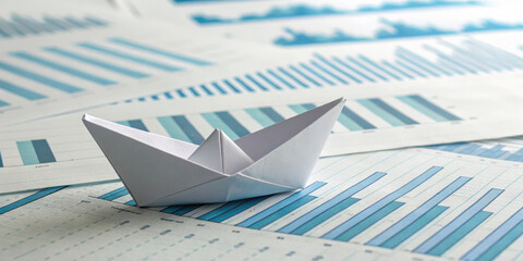 Poster - paper boat symbolizes creativity and innovation amidst financial data and charts, showcasing importance of import and index