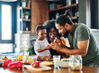© Lumos sp - child family kitchen food boy son mother father breakfast preparing egg morning healthy diet eating home black african american father cooking, parent, cute, meal