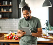 © Lumos sp - kitchen man food cooking preparation ingredient laptop recipe internet tablet guy computer happy preparing eating home business work office businessman breakfast online social media app using