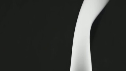 Poster - Abstract movement of grayscale wavy patterns in fluid transition