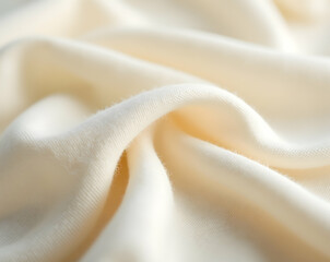Poster - Elegant folds of delicate creamy textile creating soft shadows, perfect for backgrounds, templates and product mockups with refined aesthetic and organic flowing lines