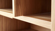 © Velem - Carpenter building a custom bookshelf in a workshop. Detail and craftsmanship