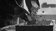 © LorelEino - Construction worker pouring concrete into a mold. Featuring strength and attention to detail