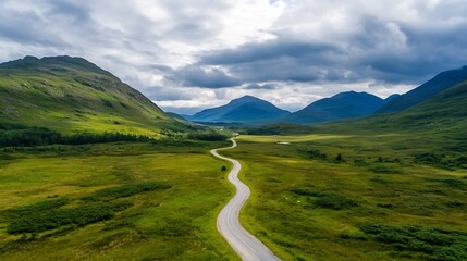 Poster - Aerial view of winding road in green valley surrounded by mountains : Generative AI