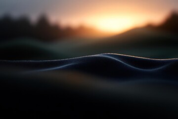 Aufkleber - A captivating abstract landscape featuring a dark foreground with a textured, wave-like structure, transitioning into a soft, blurred background of green hills and a radiant sunset with hues of