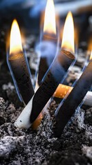 Poster - A pile of cigarette butts sitting on top of a pile of dirt, often used as a metaphor for waste or neglect.