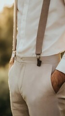 Aufkleber - A person wearing a white shirt and tan suspenders, likely for casual or workplace attire.