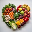 © sijoyrareassets - Heart shape by various vegetables and fruits.Healthy food concept Isolated on white background (1)
