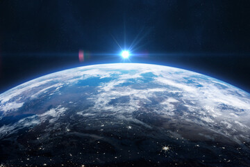 Wall Mural - earth in the outer space. blue earth planet in outer space. sunrise over earth in space.