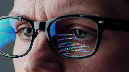 Aufkleber - Computer programmer wearing glasses reflecting lines of code while working intently on complex software development project, representing digital innovation and technological expertise
