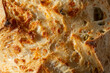 © DAVID - A top down view of a rustic olive sourdough boule, as a background.
