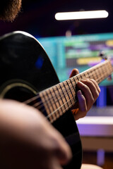 Aufkleber - Skilled producer recording his song on guitar to mix and master music on daw software, working with post production equipment. Sound engineer creating soundtracks in home studio. Close up.