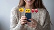 © slamet - Happy Woman Receiving Positive Feedback on Her Phone