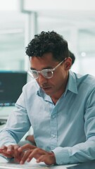 Fototapete - Glasses, coding and business man in office for software update, game development and typing. Keyboard, serious developer and computer for programming online, creative design and test app for project