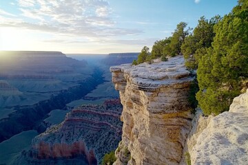 Poster - A breathtaking view of the Grand Canyon at sunrise, with golden light illuminating the layered rock formations