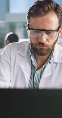 Aufkleber - Science, liquid and man with beaker on laptop for research, medical analysis and chemistry in lab. Healthcare, biotechnology and scientist with solution for sample, experiment or medicine development