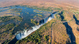 Victoria Falls with the bridge, aerial view from helicopter, Zimbabwe, Zambia