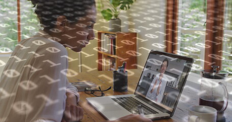 Poster - Image of binary coding over biracial businesswoman having laptop image call