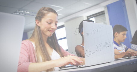 Poster - Image of mathematical equations over female student using laptop in classroom