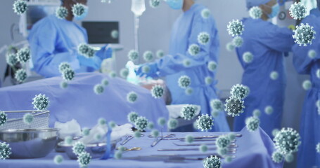 Poster - Image of virus cells over diverse surgeons