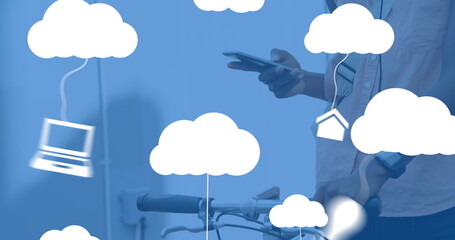 Poster - Image of clouds with electronic devices over caucasian man using smartphone