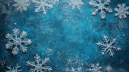 Poster - White snowflakes scattered on a textured blue background, leaving space for text or design elements.