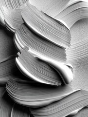 Poster - Abstract monochromatic composition of creamy white paint strokes creating a dynamic texture and smooth surface for artistic backgrounds