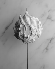 Poster - Elegant meringue swirl on metal stick against marble backdrop creates a minimalist food photography still life