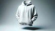 © Akram - Blank hoodie mockup floating above surface on gray background, fashion design template