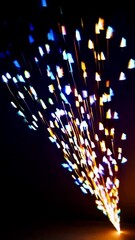 Poster - Dynamic burst of multicolored light streaks against dark background