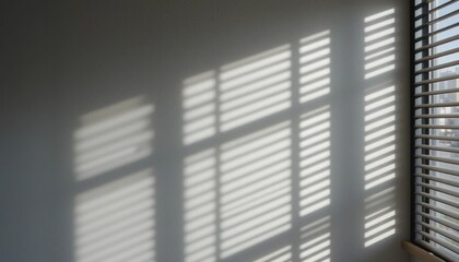 Poster - Captivating shadow patterns on wall from window blinds modern room photography urban environment natural light aesthetic concept