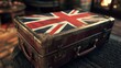 © OLEKSANDR - England, vintage suitcase with British flag