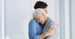 © peopleimages.com - Sad, comfort and woman hugging senior mother in retirement home for grief, support or loss. Emotional, love and female person embracing elderly mom for empathy, care and emotions in nursing facility.