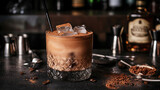 rattlesnake alcoholic cocktail drink with coffee and cocoa liquor, irish cream, ground coffee and ice in glass, dark bar counter background, bar tools and bottles