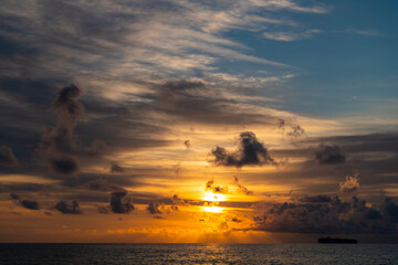 Wall Mural - Skyscape with sea sunrise. Peaceful horizon at sea nature. Romantic summer vacation on beach seascape. Sunrise sky horizon. Sea sunset view. Cloudy sunset sky and seascape at summer vacation
