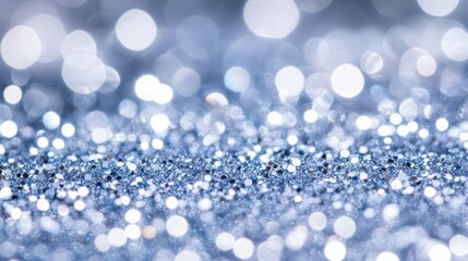 Poster - Glittering blue bokeh background sparkling in sunlight