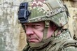 © AiMaball - A grim-faced soldier in a camouflage helmet and uniform, with facial camouflage paint, gazes intently, embodying a sense of resolute determination and the stark reality of military service.