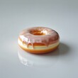 © Active Abdur Rouf - Delicious donut on a white plate with chocolate and cream, perfect for breakfast or a sweet snack