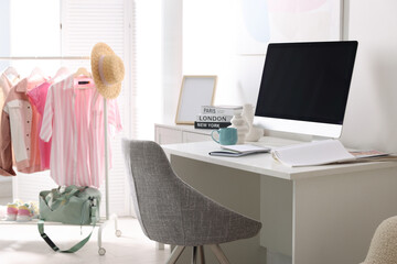Poster - Home office. Comfortable workplace near white wall. Desk with computer and other furniture in room