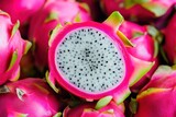 Fresh vibrant dragon fruit display with sliced interior