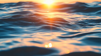 Wall Mural - close-up of ocean waves at sunset, sun reflecting on water surface.